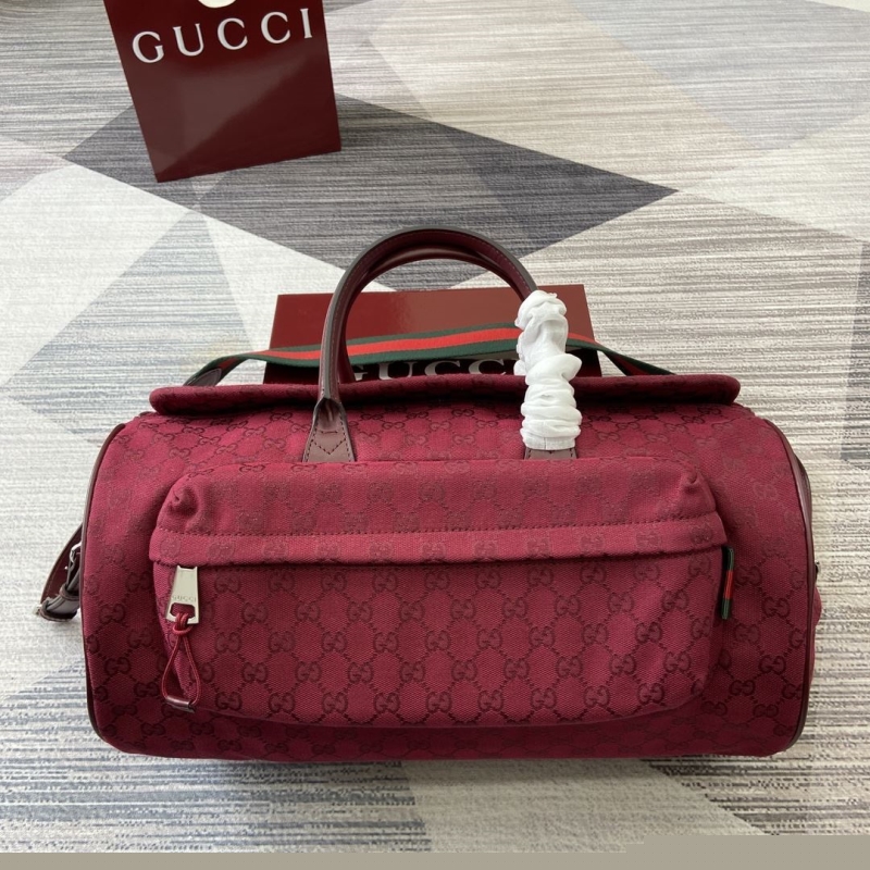 G*u*i top handle bags
